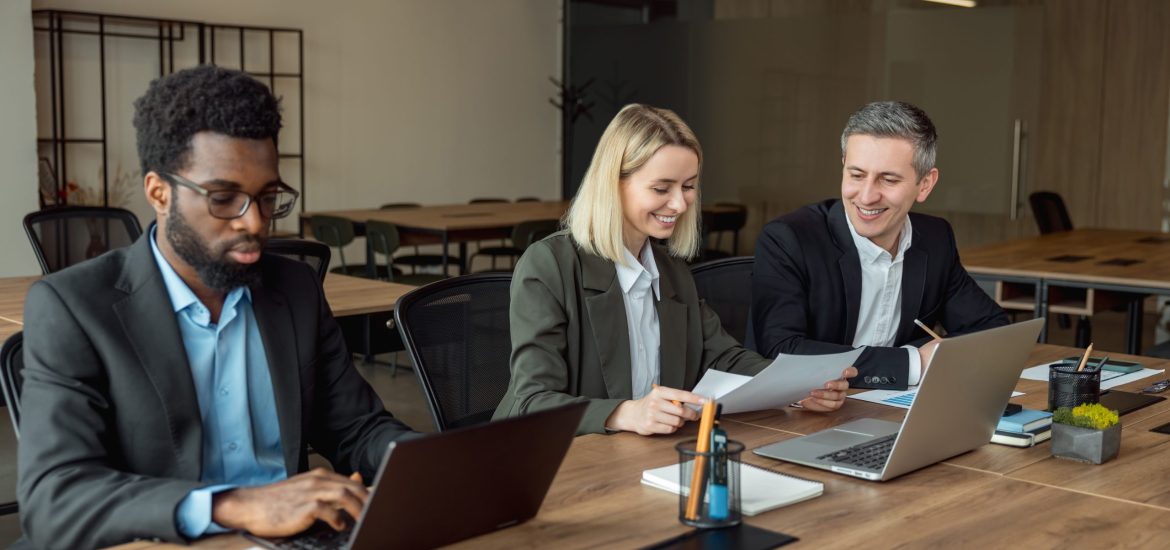 Lawyers at work. Lawyers working together on the project and looking interested and involved